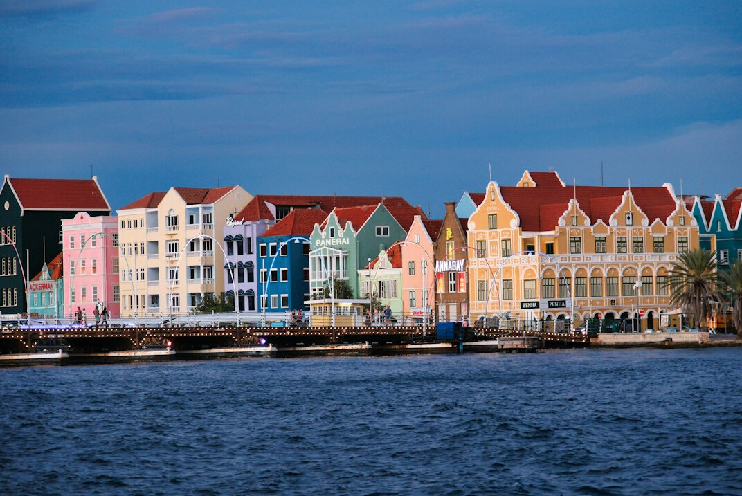Colorful merchant houses along a historic waterfront