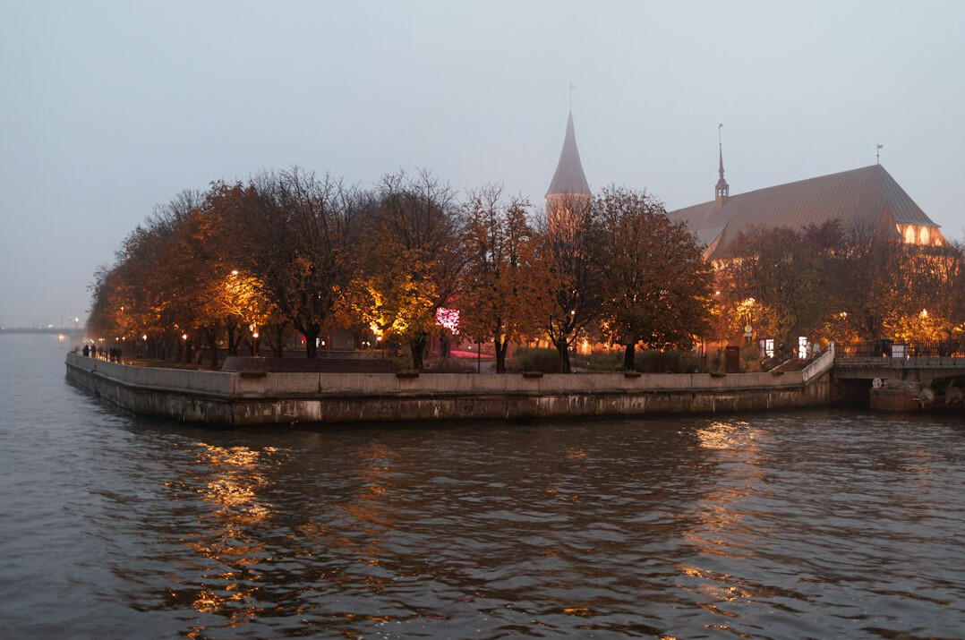 Riverside cathedral island with gothic brick church